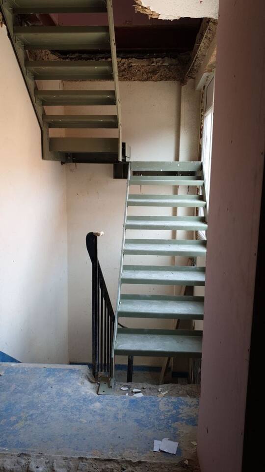 Built: Dog-leg stair through the floors